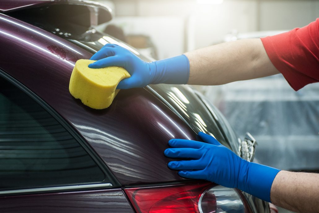 washing car with sponge